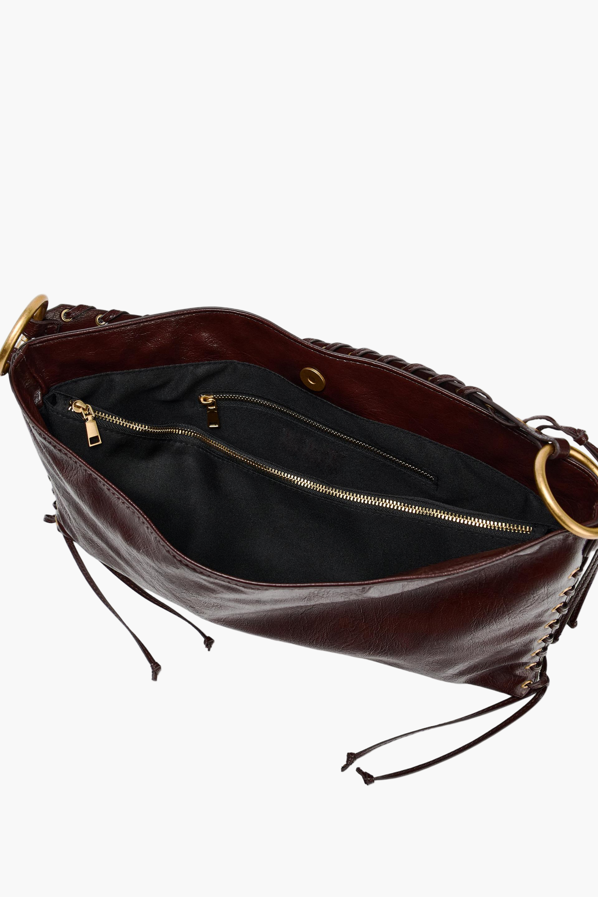 Interior view of spacious shoulder bag with zipper – fits phone and essentials