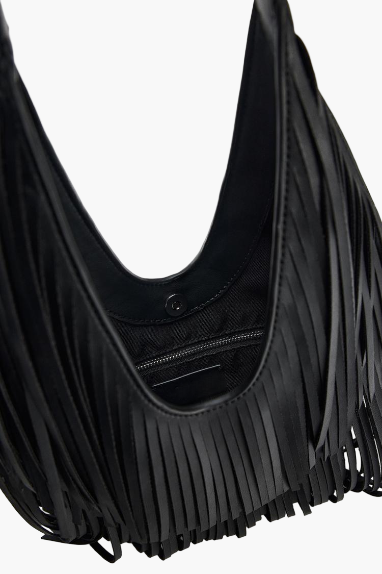 leather fringe tote bag close up detail black women