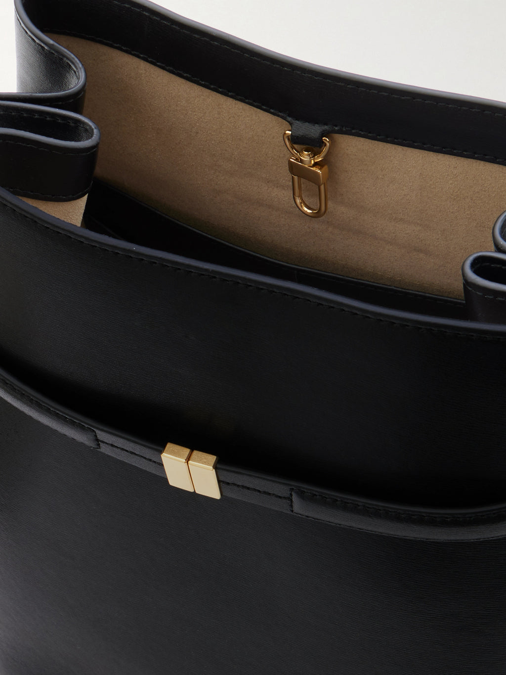 black bucket bag open interior women spacious leather structured