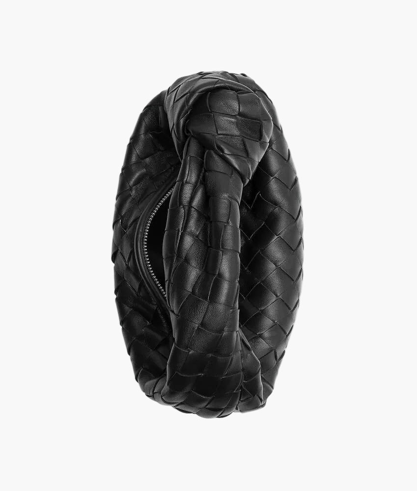 woven mini bag black side view women curved handle sculptural