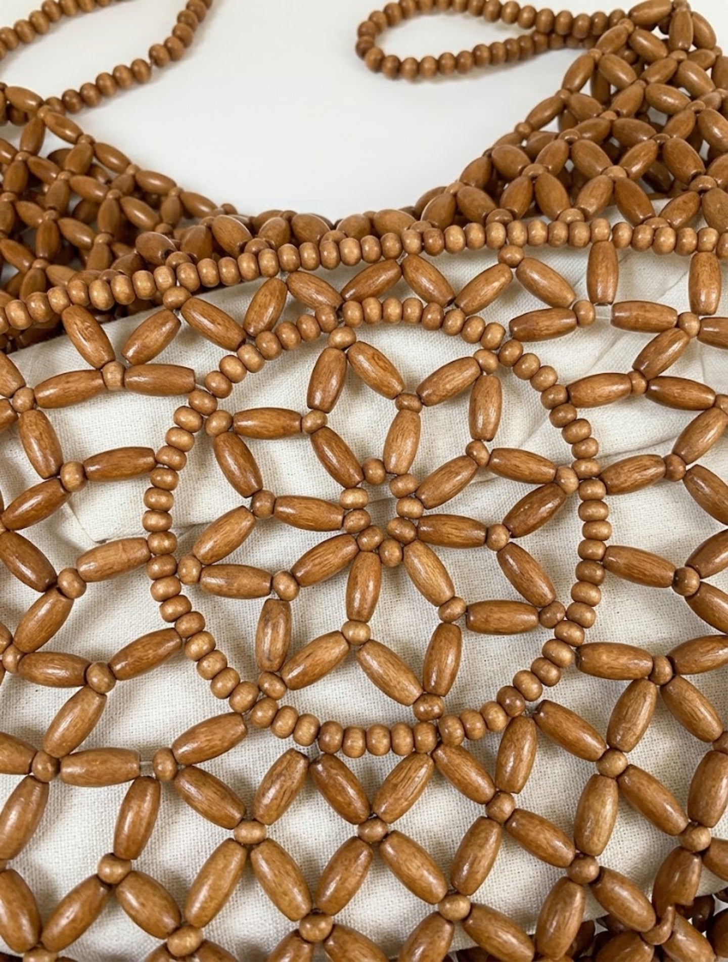 close up handmade wooden bead tote bag floral lattice detail natural tan - tan - tote bag