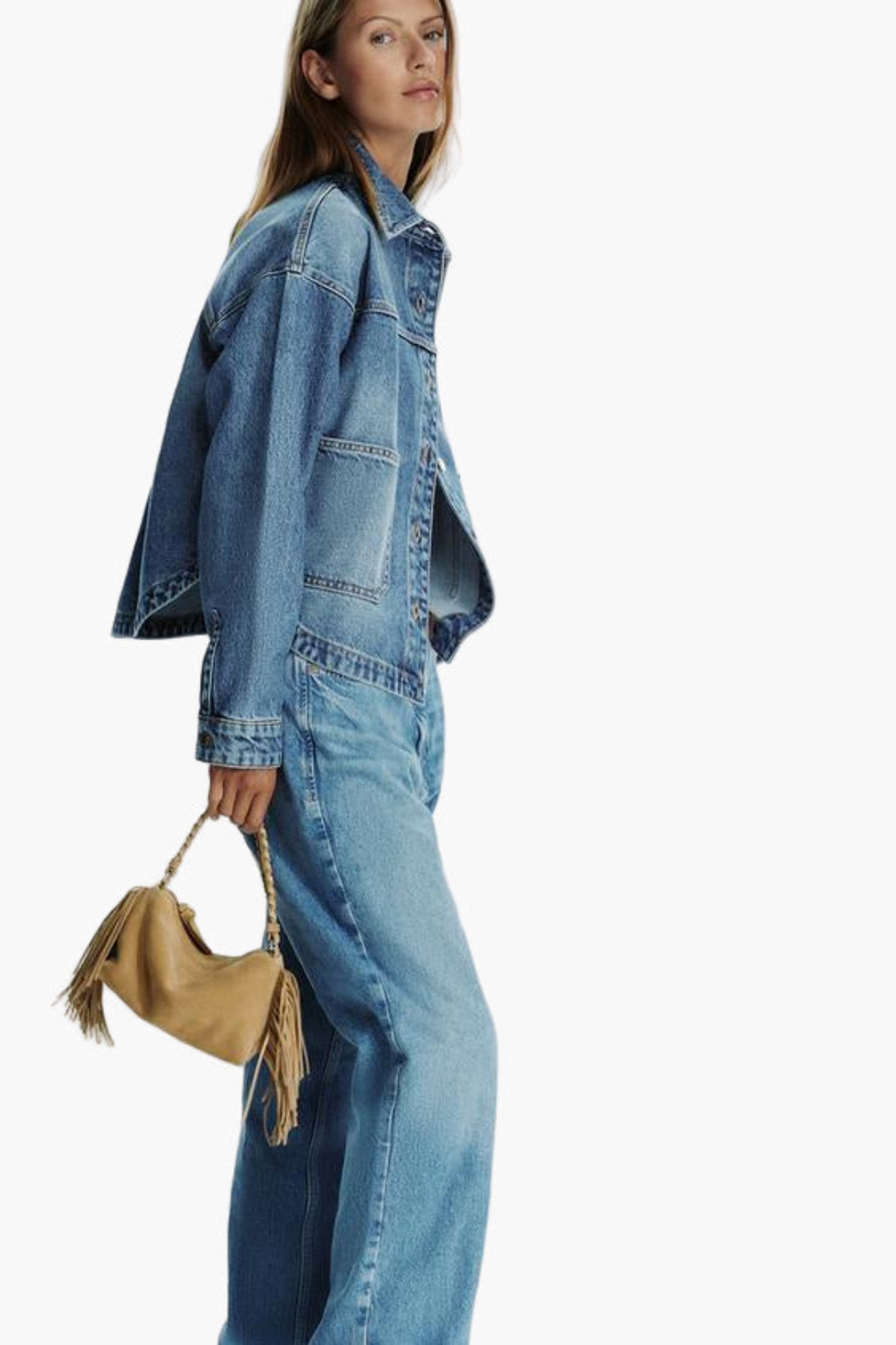women carrying sand fringe suede bag crossbody street style casual